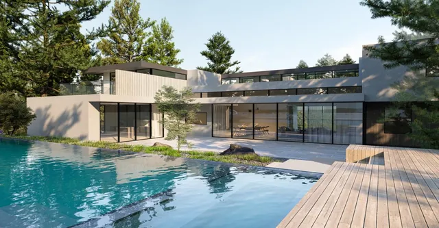 a front view of a house with a yard and shrubs