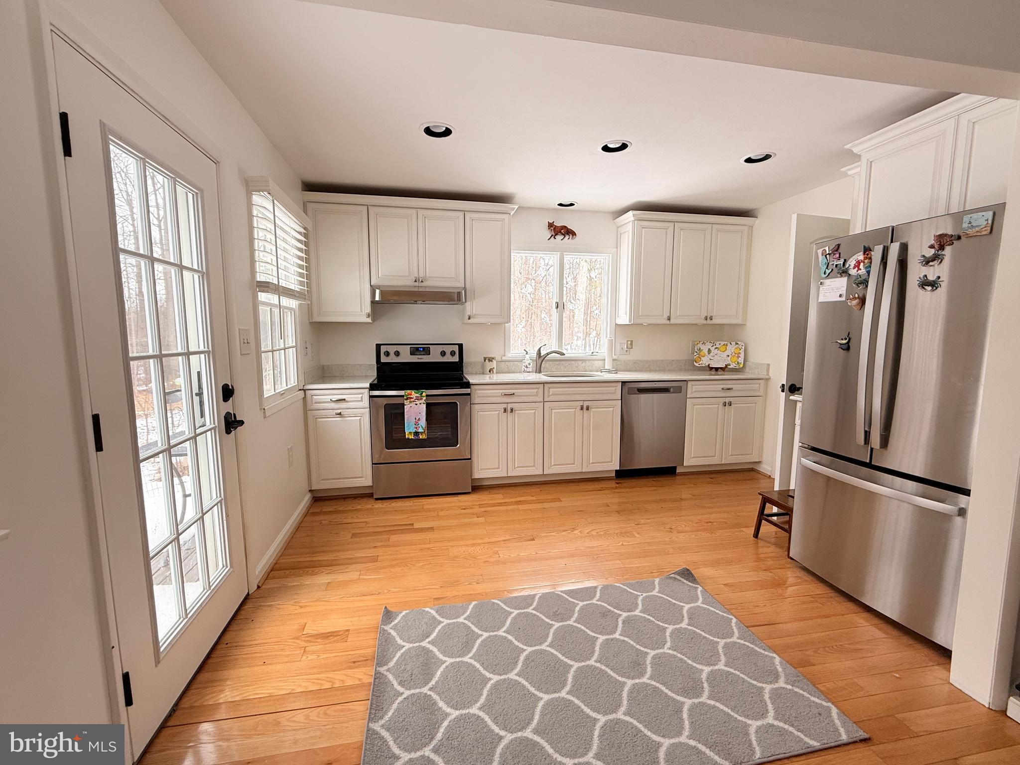 2120 Blue Mt Road Monkton, MD 21111 - Photo 3 of 11 a kitchen with stainless steel appliances granite countertop a refrigerator oven a sink and dishwasher