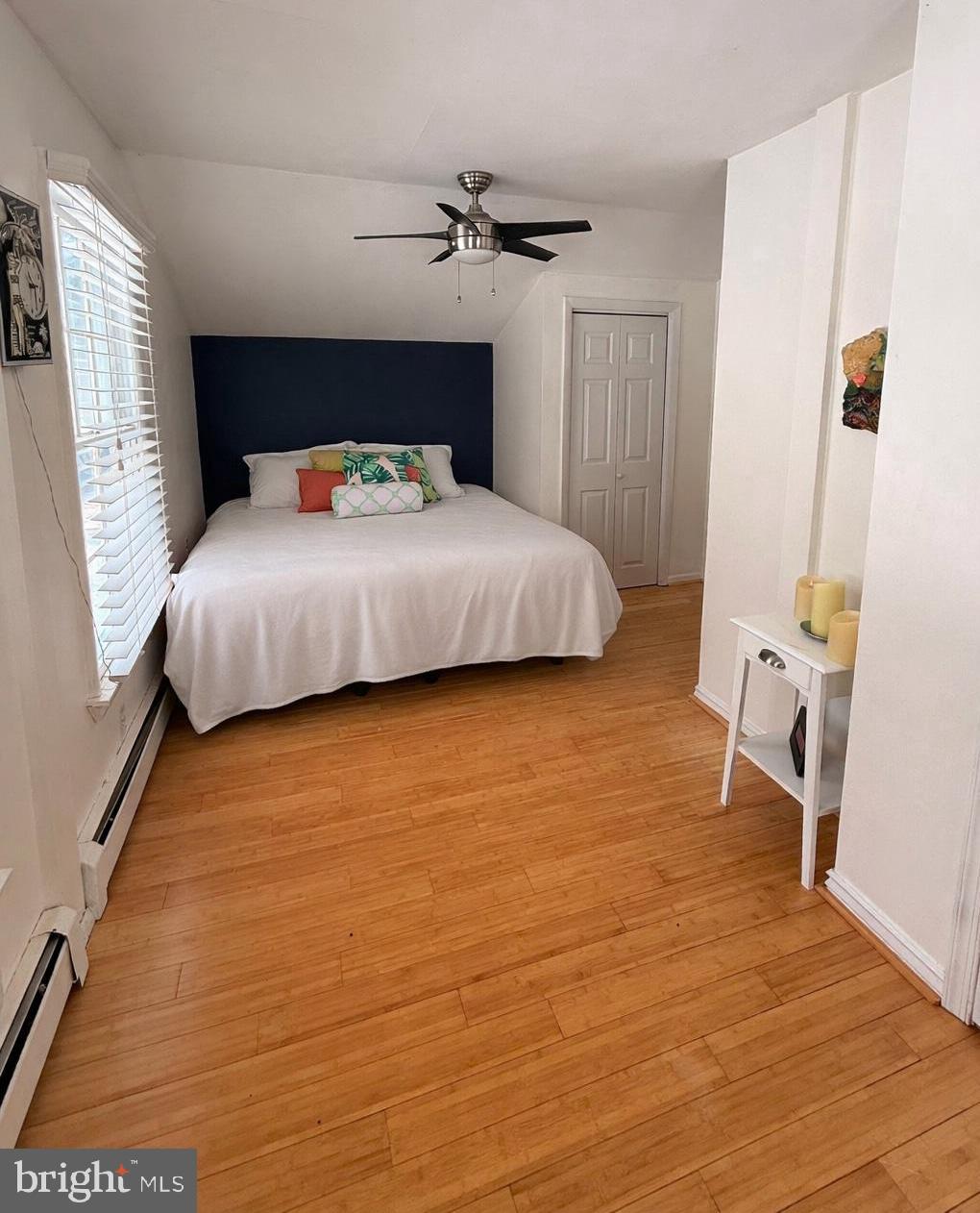 2120 Blue Mt Road Monkton, MD 21111 - Photo 8 of 11 a bedroom with a bed and wooden floor