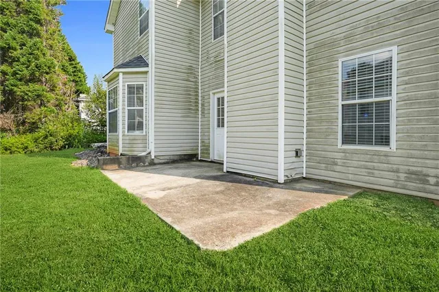 a view of a backyard with a garden