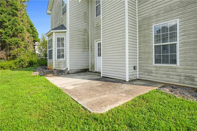 a view of a backyard with plants