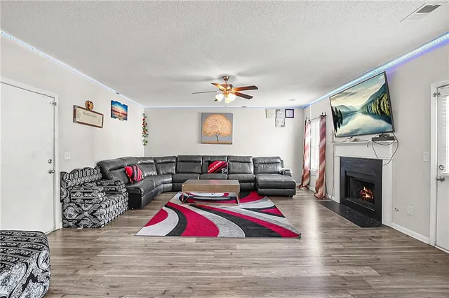 a room with furniture and a fireplace