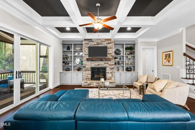 a living room with furniture and a rug