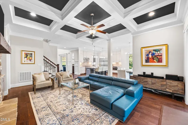 a bathroom with a sink mirror and toilet