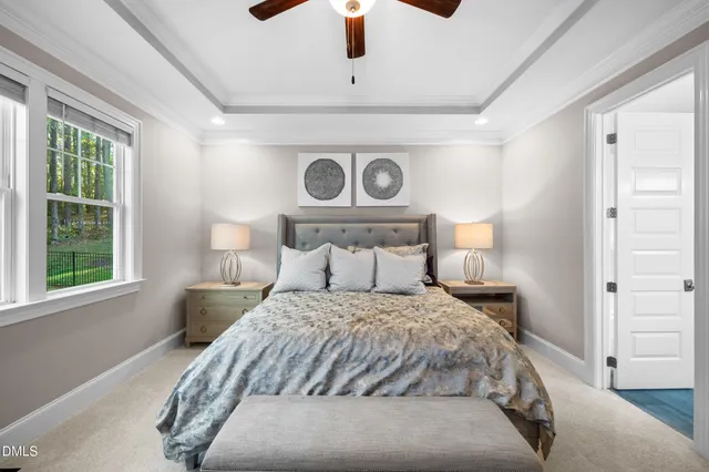 a bathroom with a bathtub and a window