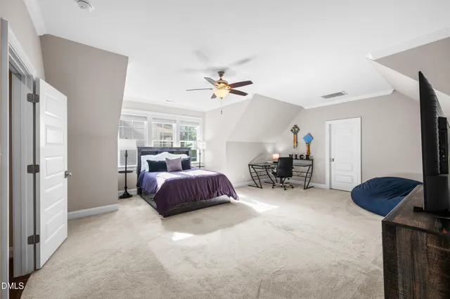 a bathroom with a granite countertop sink toilet a large mirror a shower and a bathtub