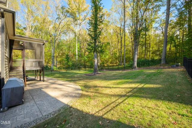 a view of a balcony with chair and table