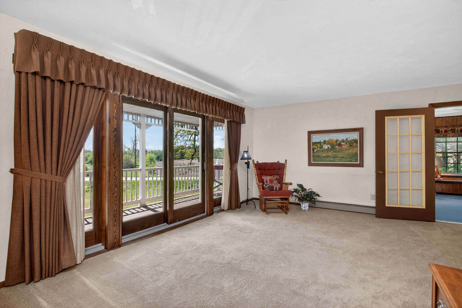 2660 252nd Street De Witt, IA 52742 - Photo 19 of 45 a living room with furniture and a window