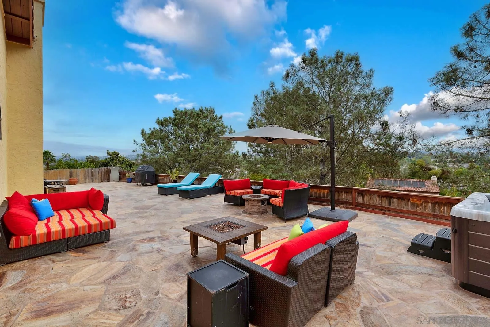 421 Via Savoy Encinitas, CA 92024 - Photo 1 of 37 a area with lots of furniture and a fire pit