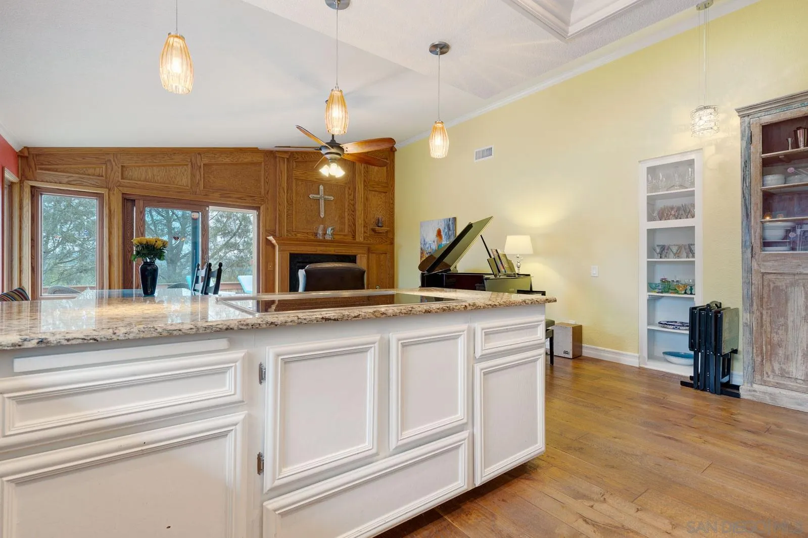 421 Via Savoy Encinitas, CA 92024 - Photo 11 of 37 a view of living room with granite countertop furniture and fireplace
