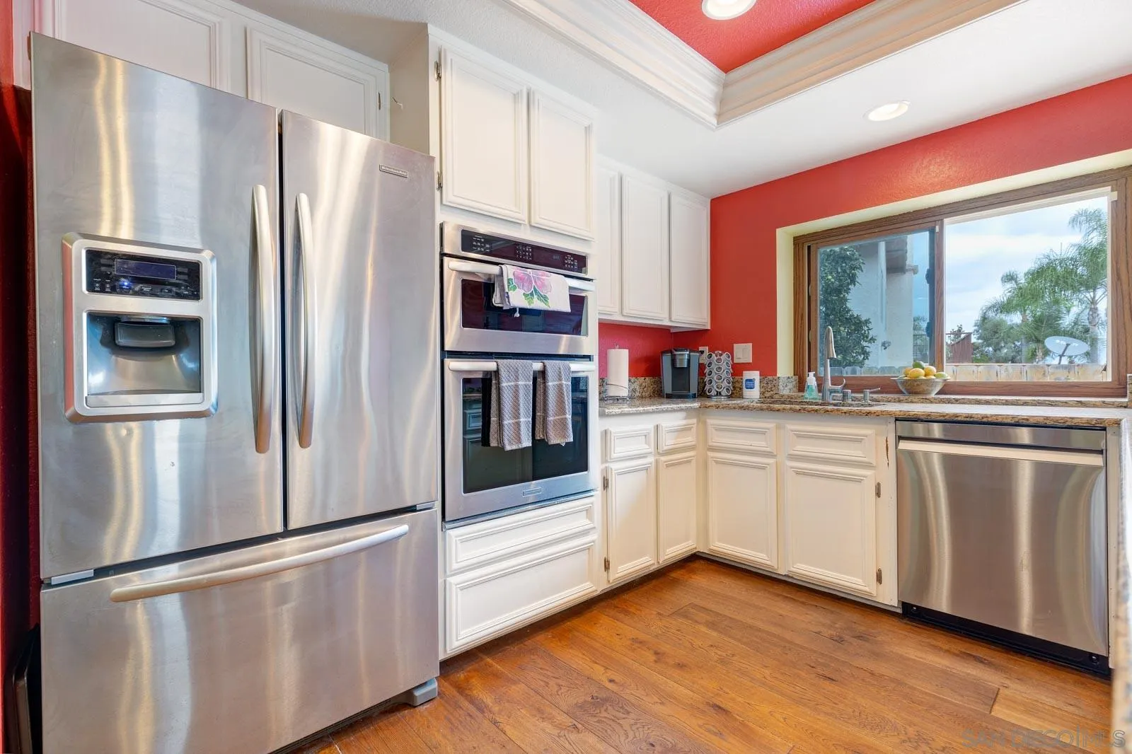 421 Via Savoy Encinitas, CA 92024 - Photo 13 of 37 a kitchen with stainless steel appliances a refrigerator sink and microwave