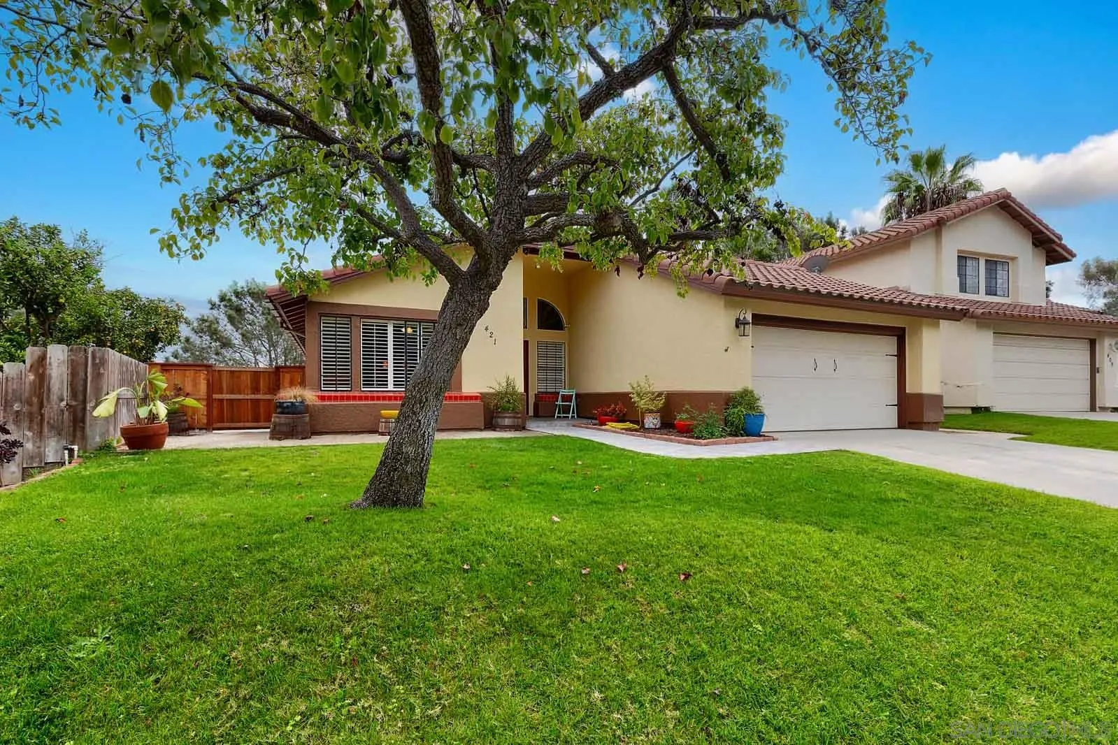 421 Via Savoy Encinitas, CA 92024 - Photo 32 of 37 a front view of house with yard and green space