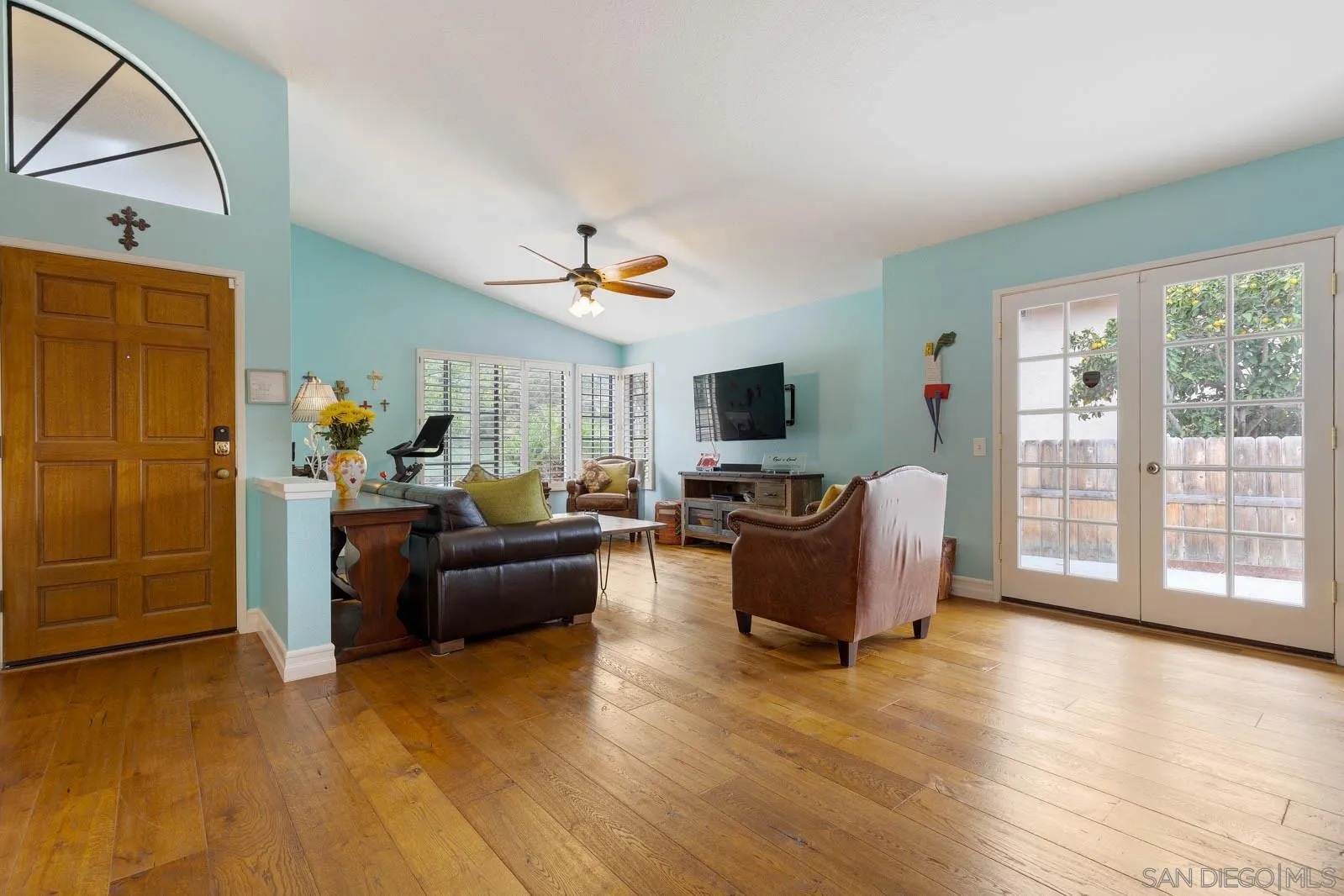 421 Via Savoy Encinitas, CA 92024 - Photo 6 of 37 a living room with furniture and a flat screen tv
