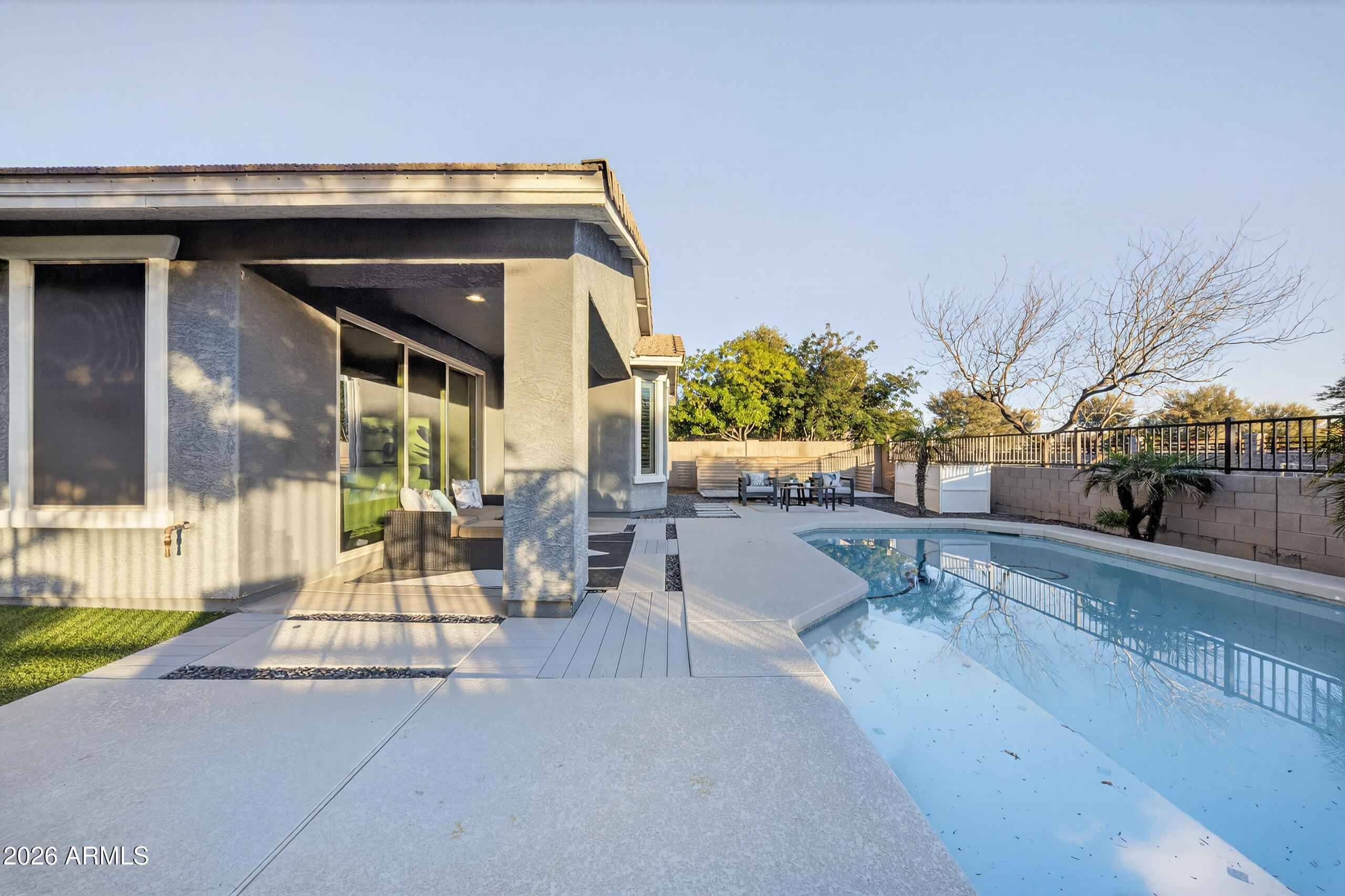 5067 South Girard Street Gilbert, AZ 85298 - Photo 12 of 15 a living room with furniture and a wooden floor