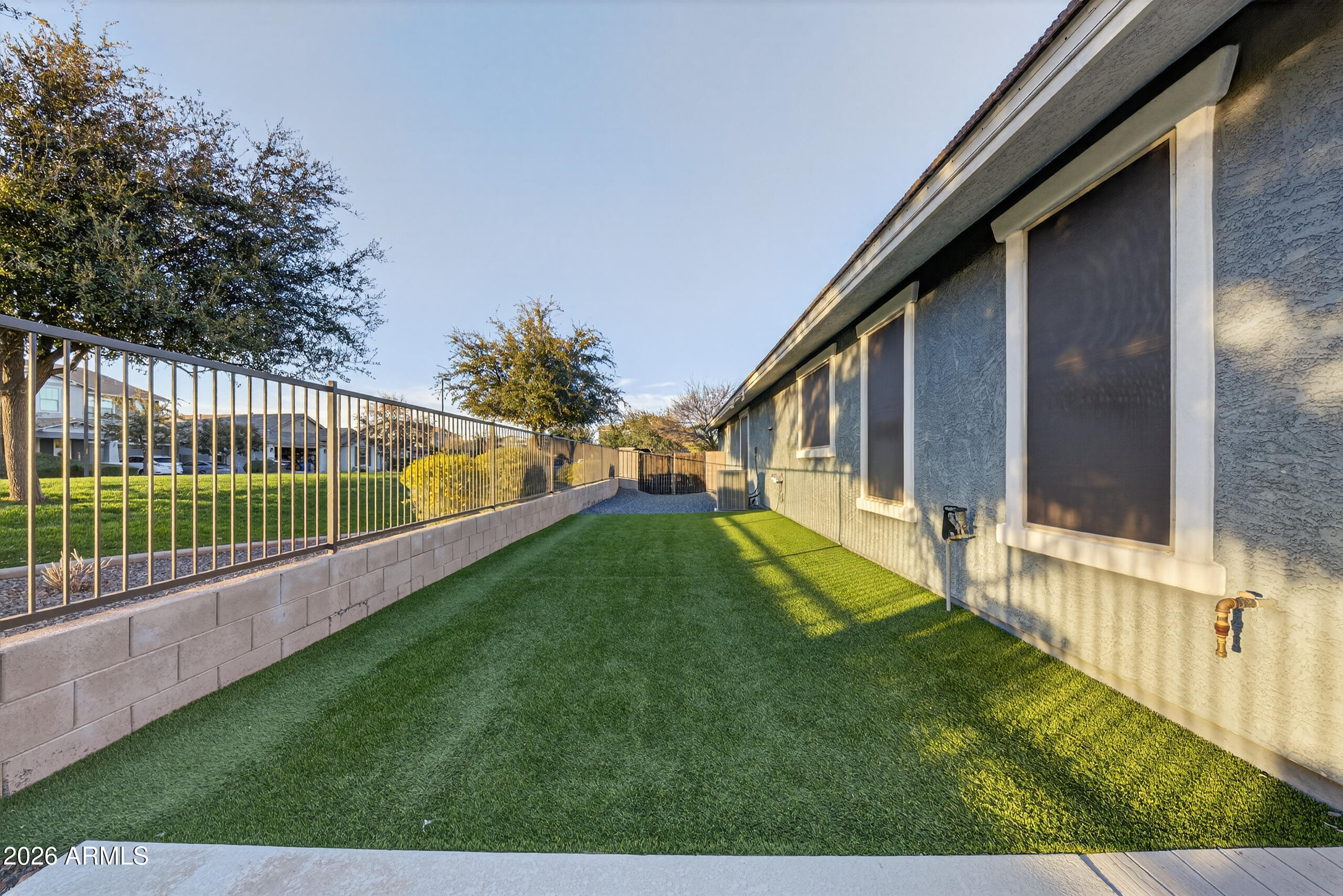5067 South Girard Street Gilbert, AZ 85298 - Photo 14 of 15 a view of backyard with garden and deck