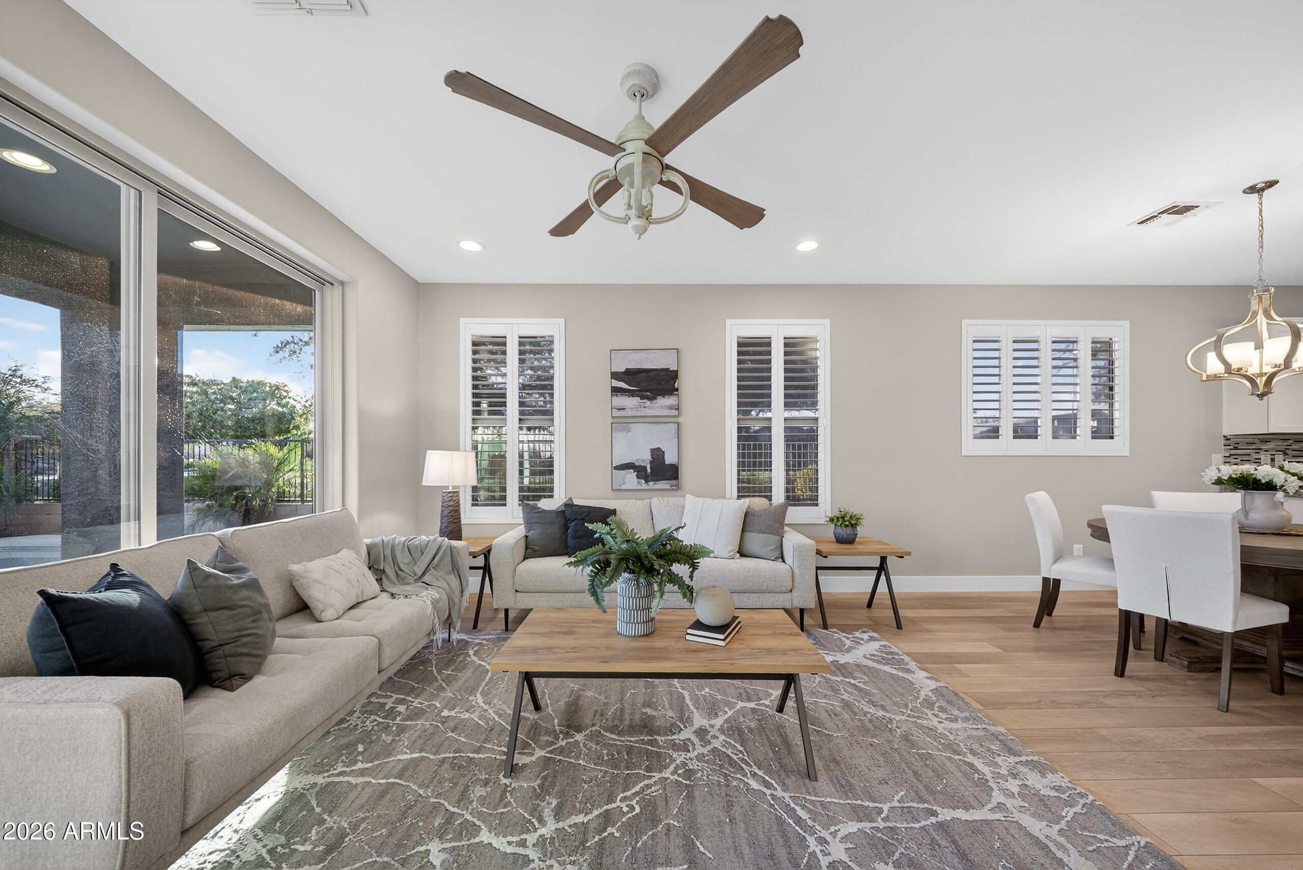5067 South Girard Street Gilbert, AZ 85298 - Photo 3 of 15 a living room with furniture and a large window