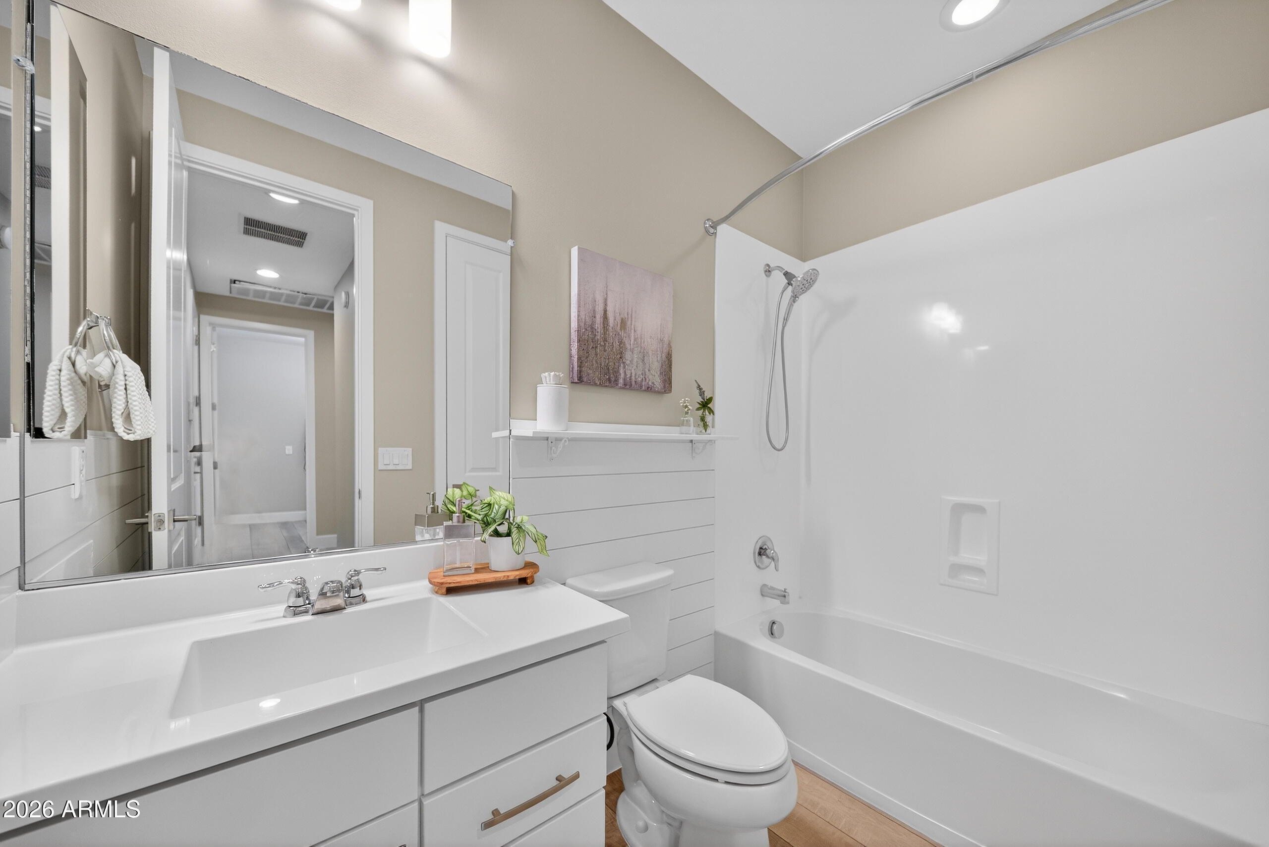 5067 South Girard Street Gilbert, AZ 85298 - Photo 9 of 15 a bathroom with a sink a toilet and shower