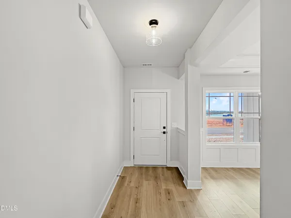 a front view of a building with outdoor space