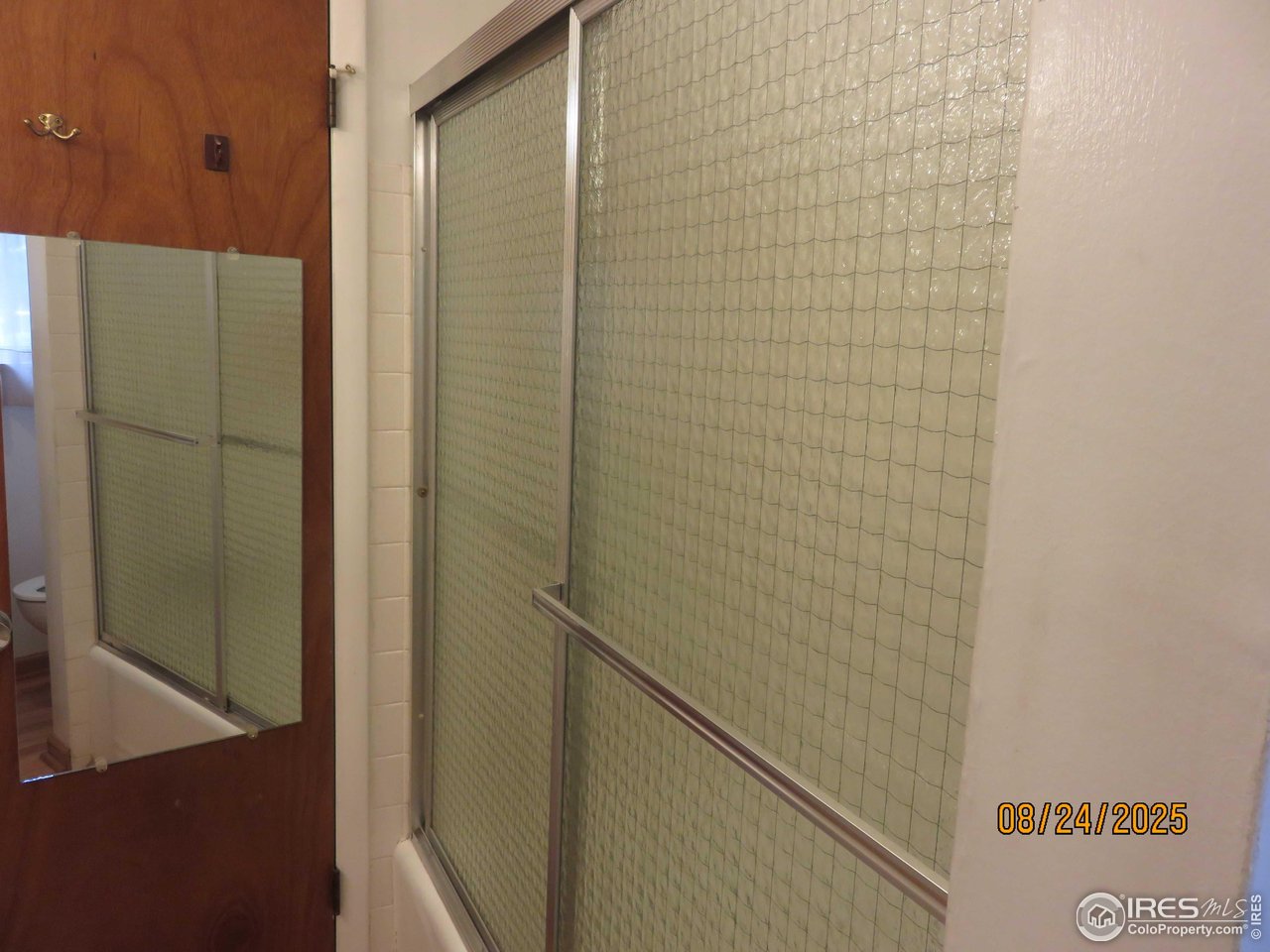 425 35th Court Greeley, CO 80634 - Photo 17 of 36 a bathroom with a shower