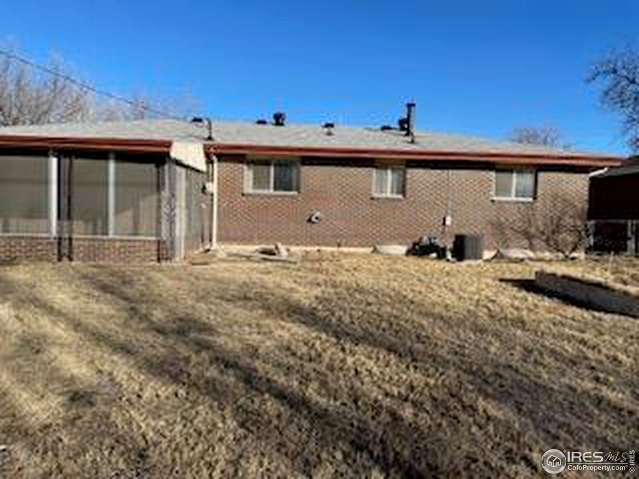 425 35th Court Greeley, CO 80634 - Photo 26 of 36 a front view of a house with a yard
