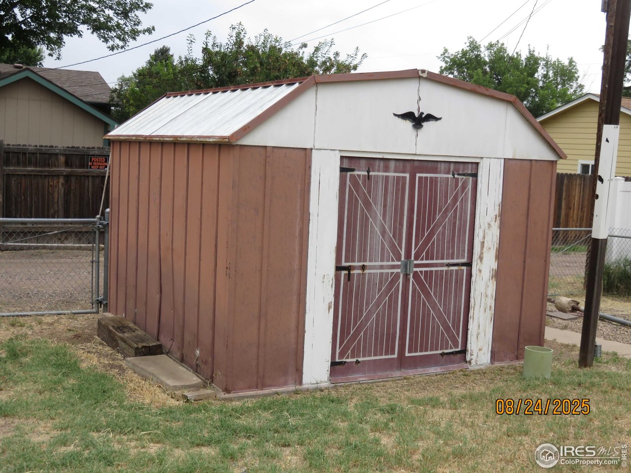 425 35th Court Greeley, CO 80634 - Photo 32 of 36 a view of a backyard with potted plants
