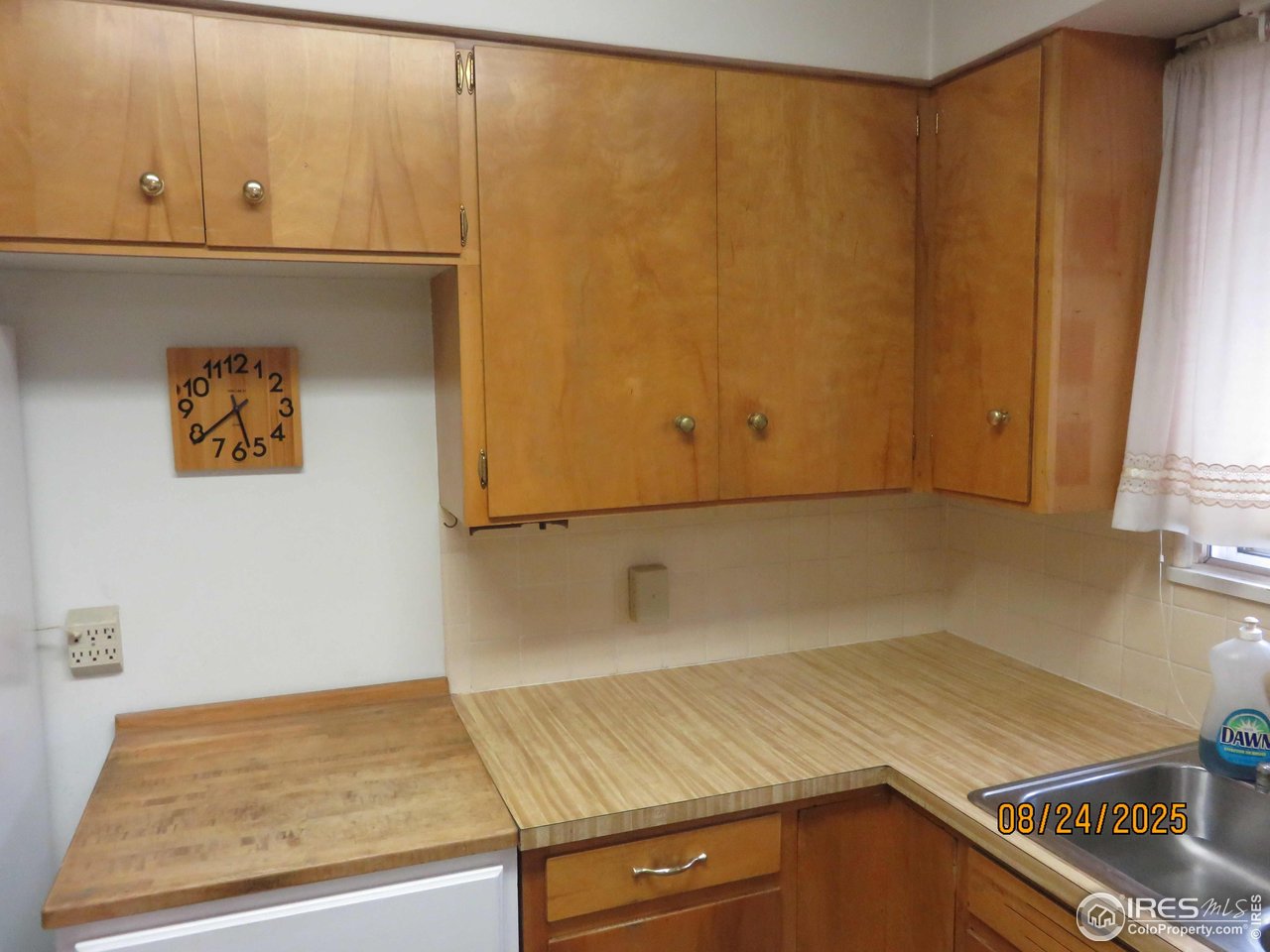 425 35th Court Greeley, CO 80634 - Photo 6 of 36 a room with storage and utility