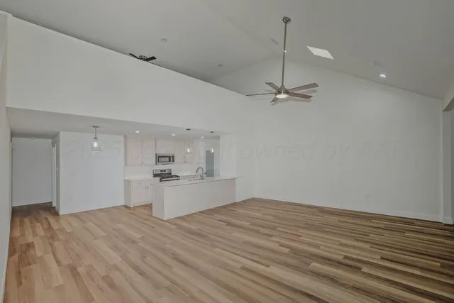 a view of a kitchen with marble kitchen and sink