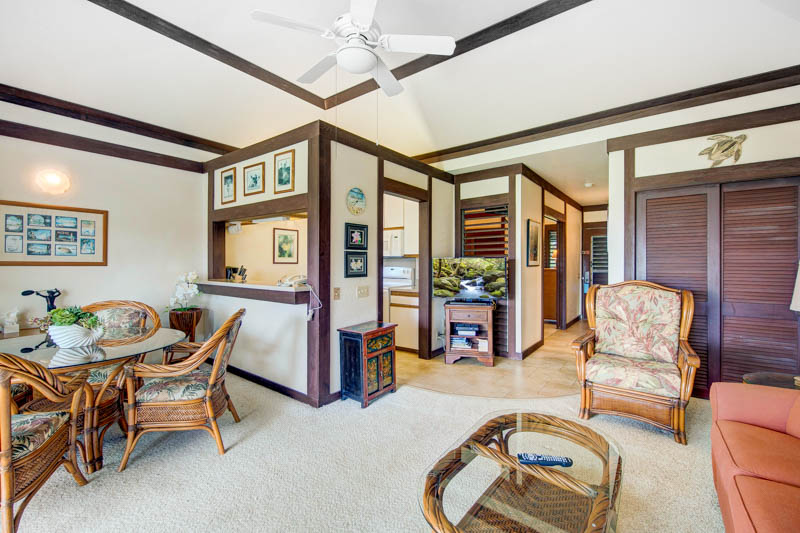 2253 Poipu Road, Unit 178 Koloa, HI 96756 - Photo 5 of 26 a living room with furniture and a floor to ceiling window