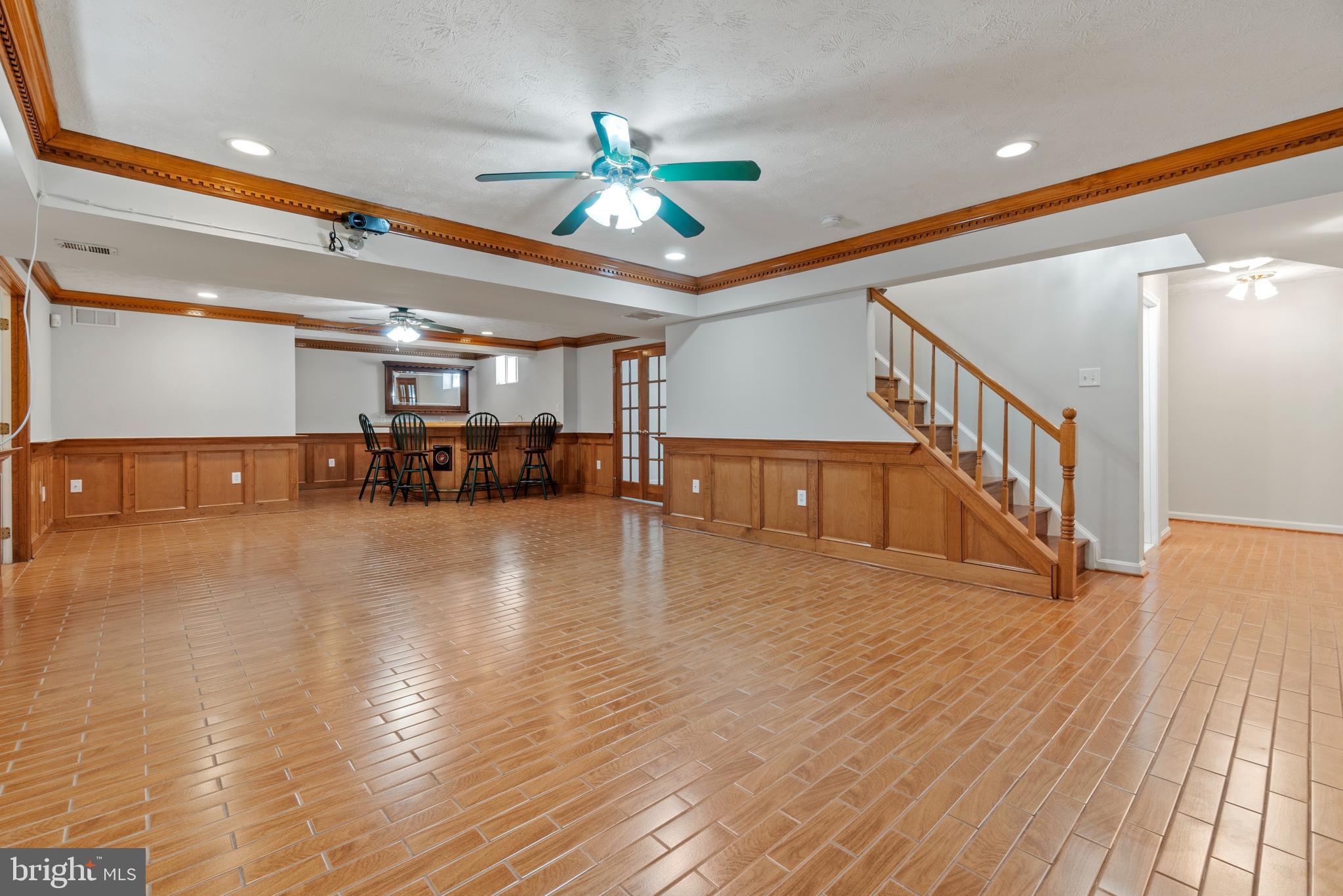 5 Ashbrook Road Stafford, VA 22554 - Photo 29 of 44 Large rec room with custom bar with tile floors