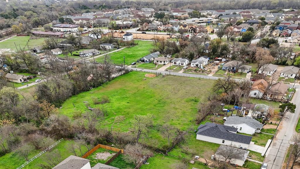 4723 Collins Avenue Dallas, TX 75210 - Photo 1 of 18 an aerial view of residential houses with outdoor space