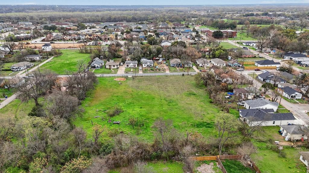 4723 Collins Avenue Dallas, TX 75210 - Photo 3 of 18 an aerial view of residential houses with outdoor space and trees