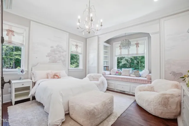 a kitchen with kitchen island granite countertop wooden cabinets and a stove