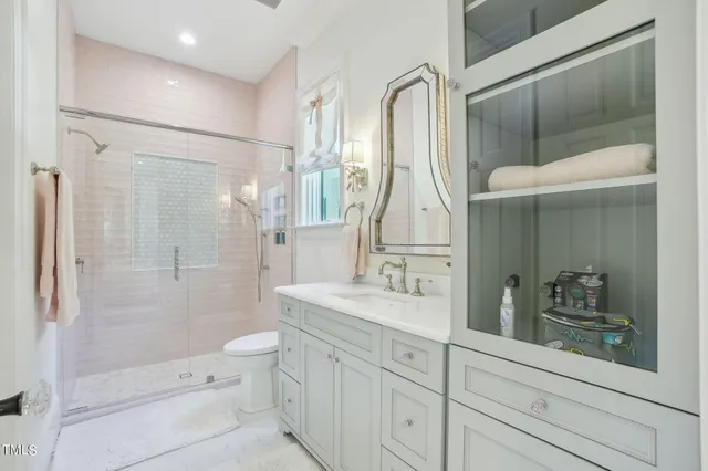 a kitchen with stainless steel appliances granite countertop a stove and a wooden cabinets