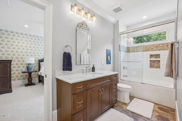 a view of a livingroom with furniture and a chandelier