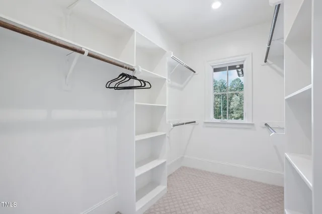 a view of a patio with a table and chairs