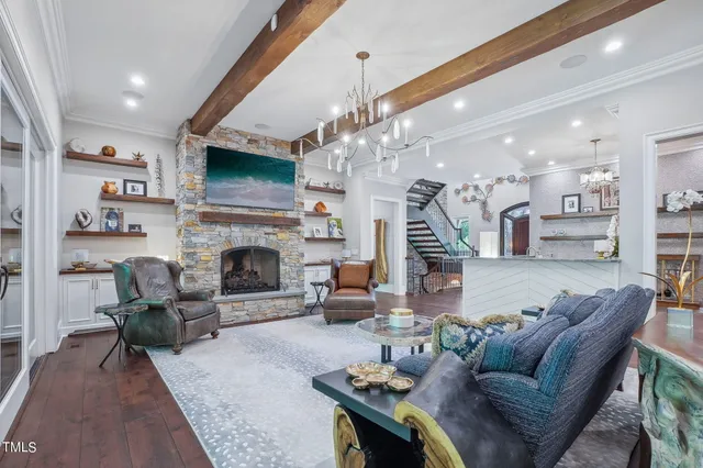 a kitchen with stainless steel appliances granite countertop a stove and a refrigerator
