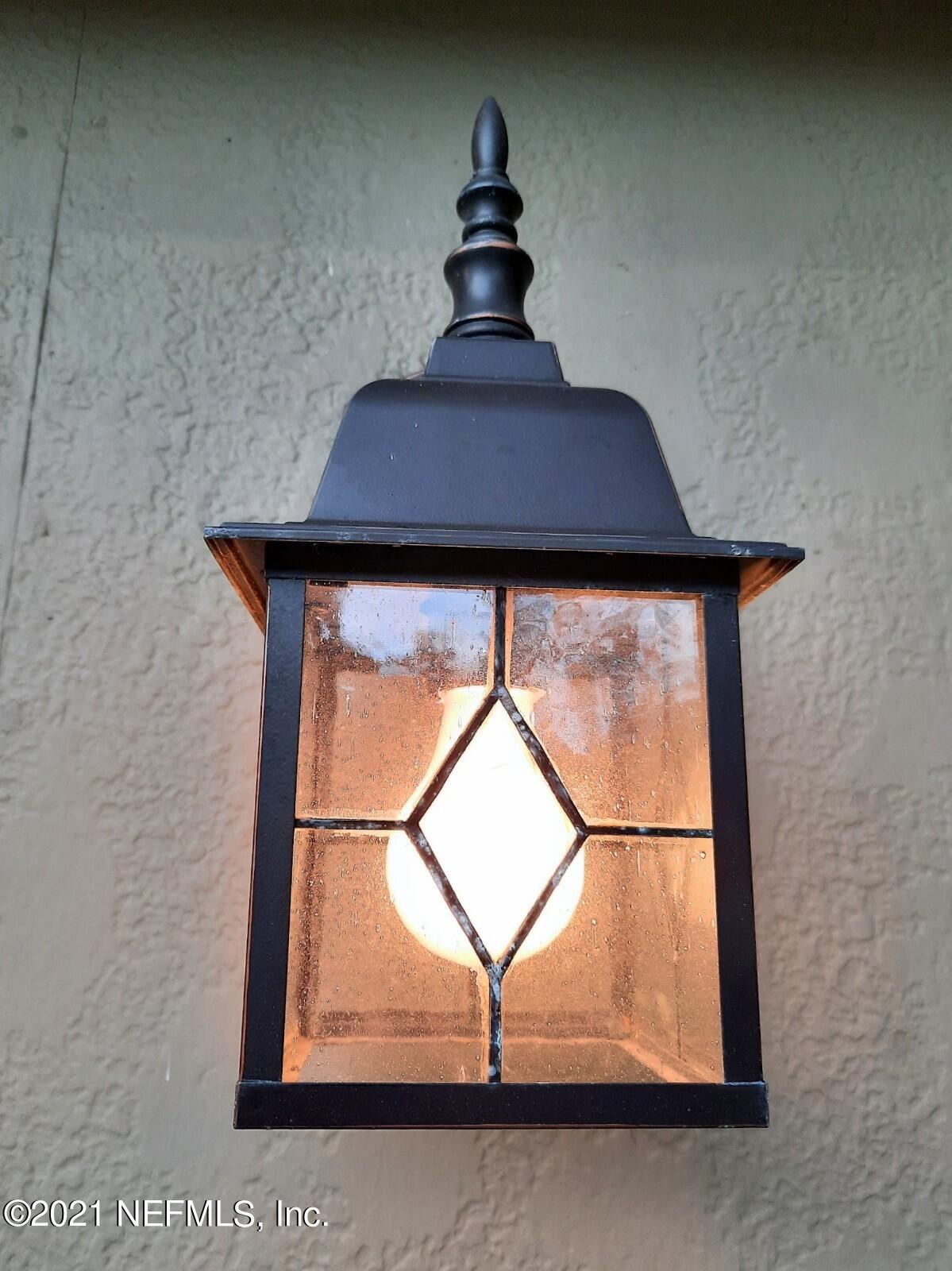 5112 Damascus Road North Jacksonville, FL 32207 - Photo 54 of 67 5112 DAMASCUS PATIO COACH LIGHTING