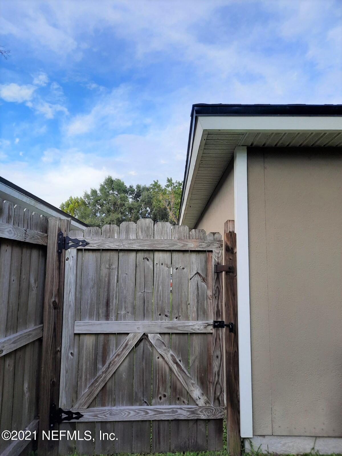 5112 Damascus Road North Jacksonville, FL 32207 - Photo 56 of 67 5112 DAMASCUS FENCE GATE