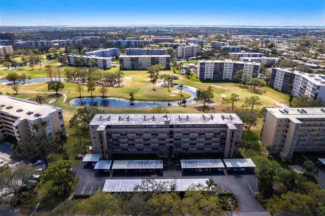 a view of a city with lawn chairs