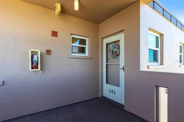 a view of an entryway with front door