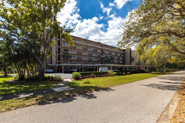 a view of a playground with basketball court