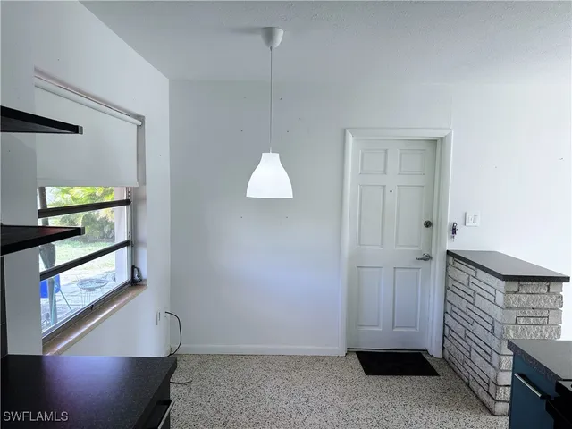 a room with cabinets and a wooden floor