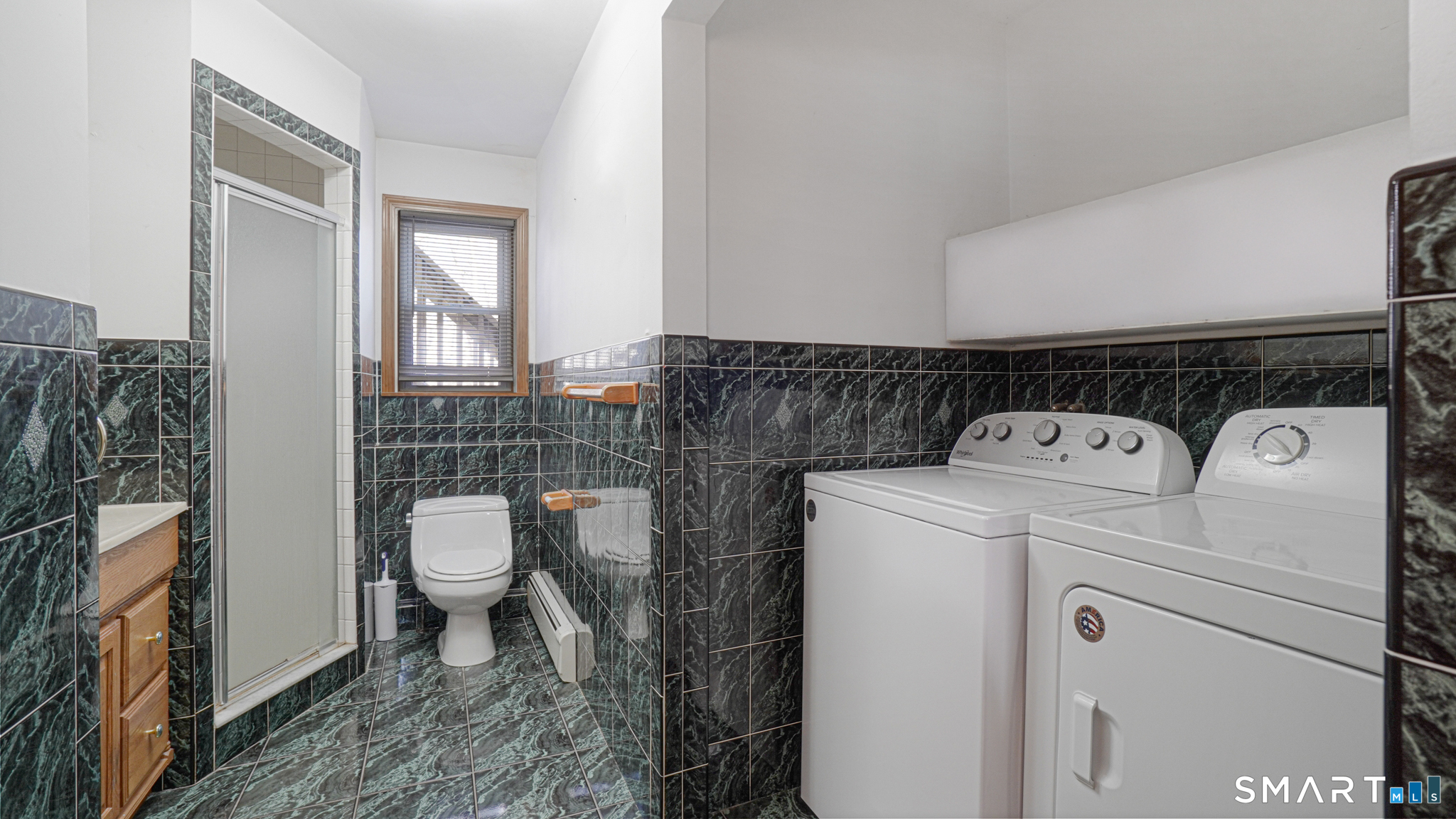 997 Meriden Avenue Southington, CT 06489 - Photo 12 of 24 a utility room with dryer and washer