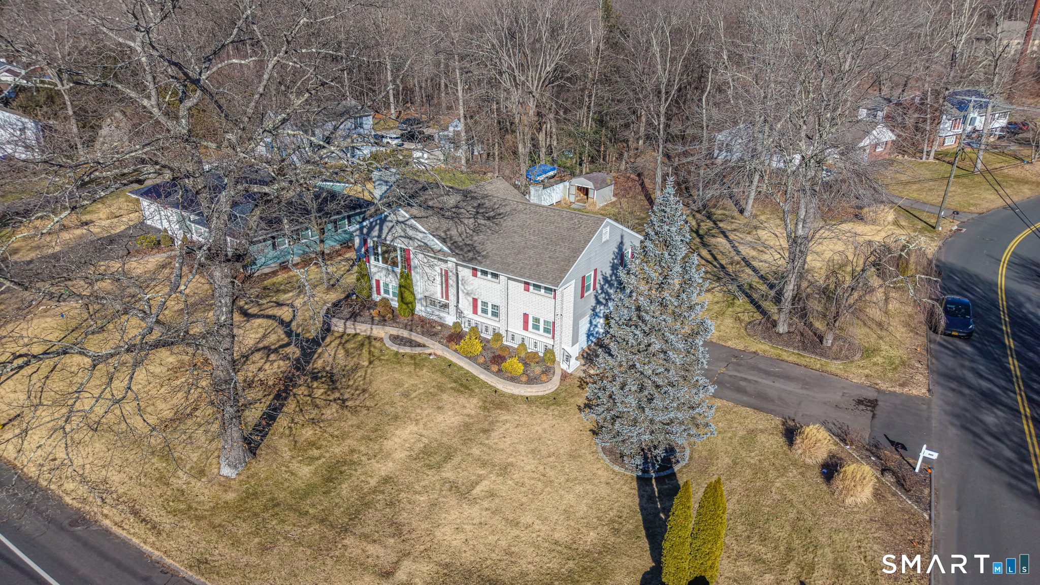 997 Meriden Avenue Southington, CT 06489 - Photo 23 of 24 a view of building along with trees