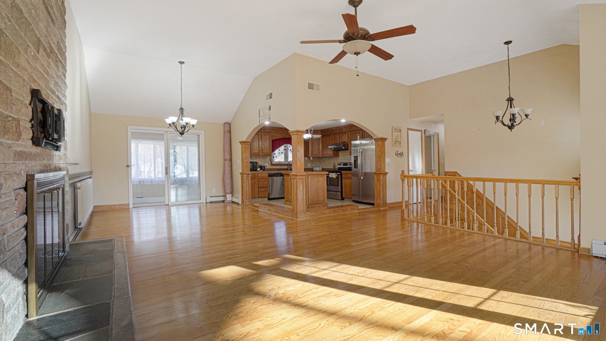 997 Meriden Avenue Southington, CT 06489 - Photo 3 of 24 a view of a living room and a ceiling fan floor