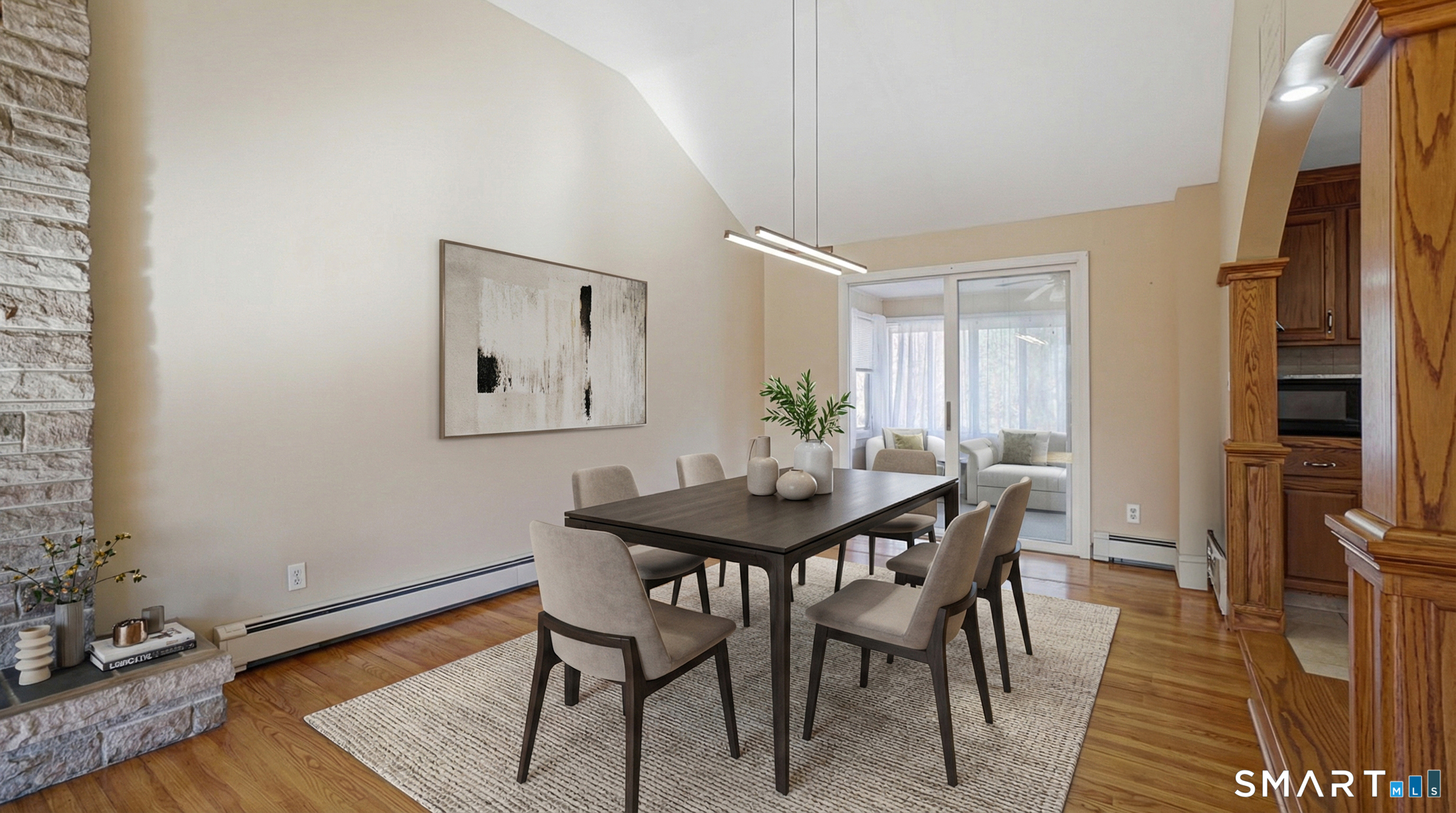 997 Meriden Avenue Southington, CT 06489 - Photo 5 of 24 a view of a dining room with furniture and wooden floor