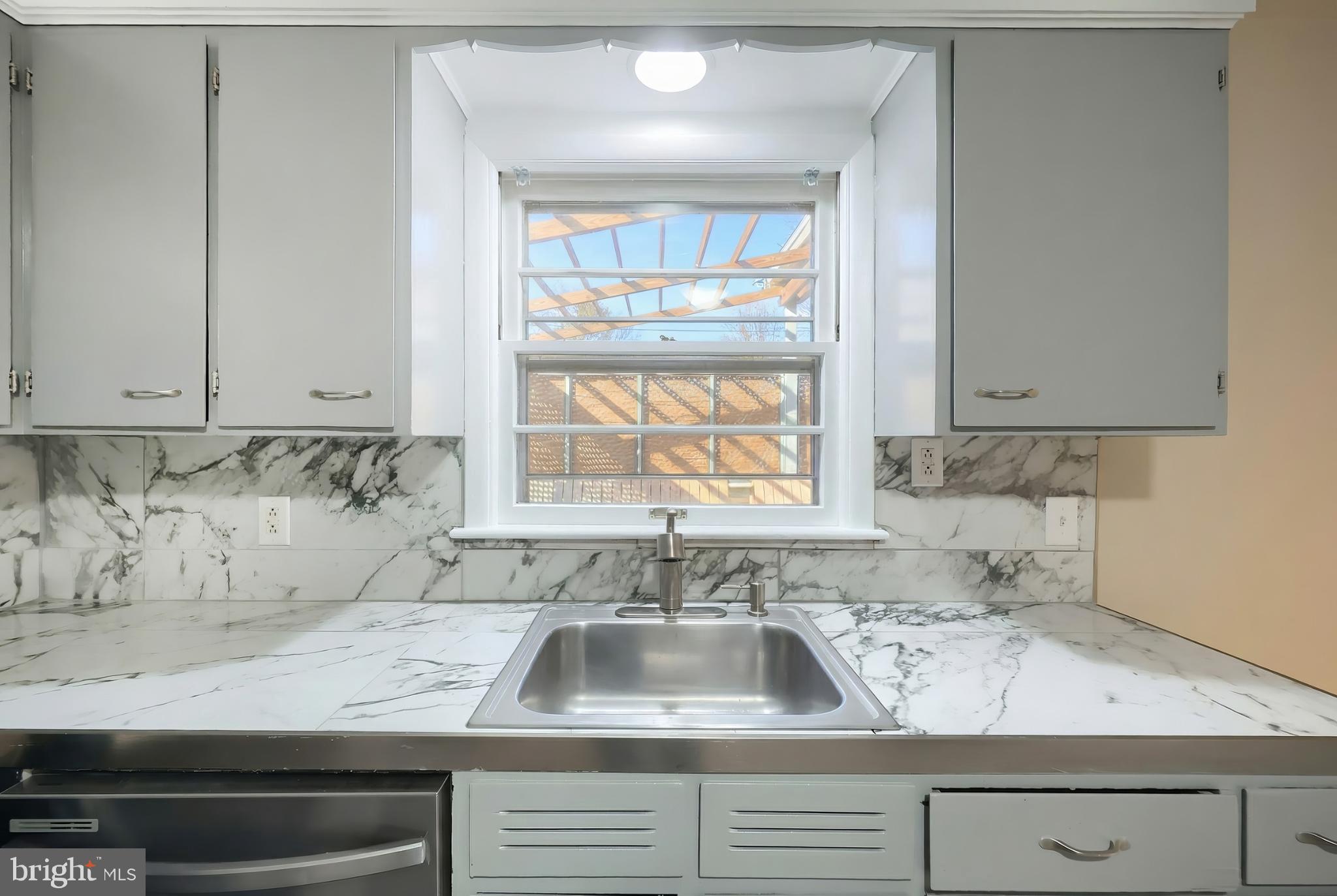 1615 Crestlyn Road York, PA 17403 - Photo 14 of 46 Bright kitchen with marble countertops and view.
