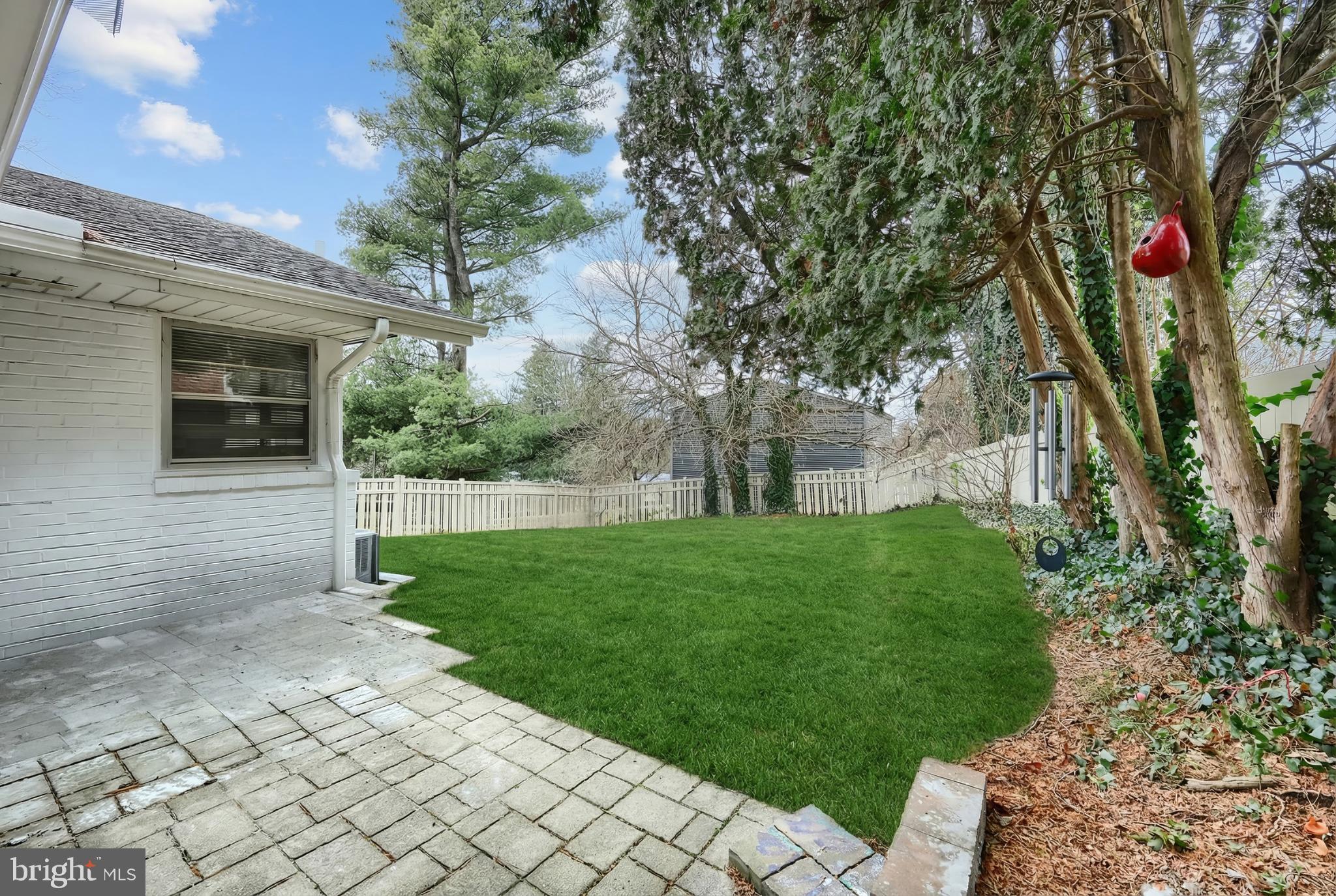 1615 Crestlyn Road York, PA 17403 - Photo 36 of 46 Lush green yard with serene outdoor space.