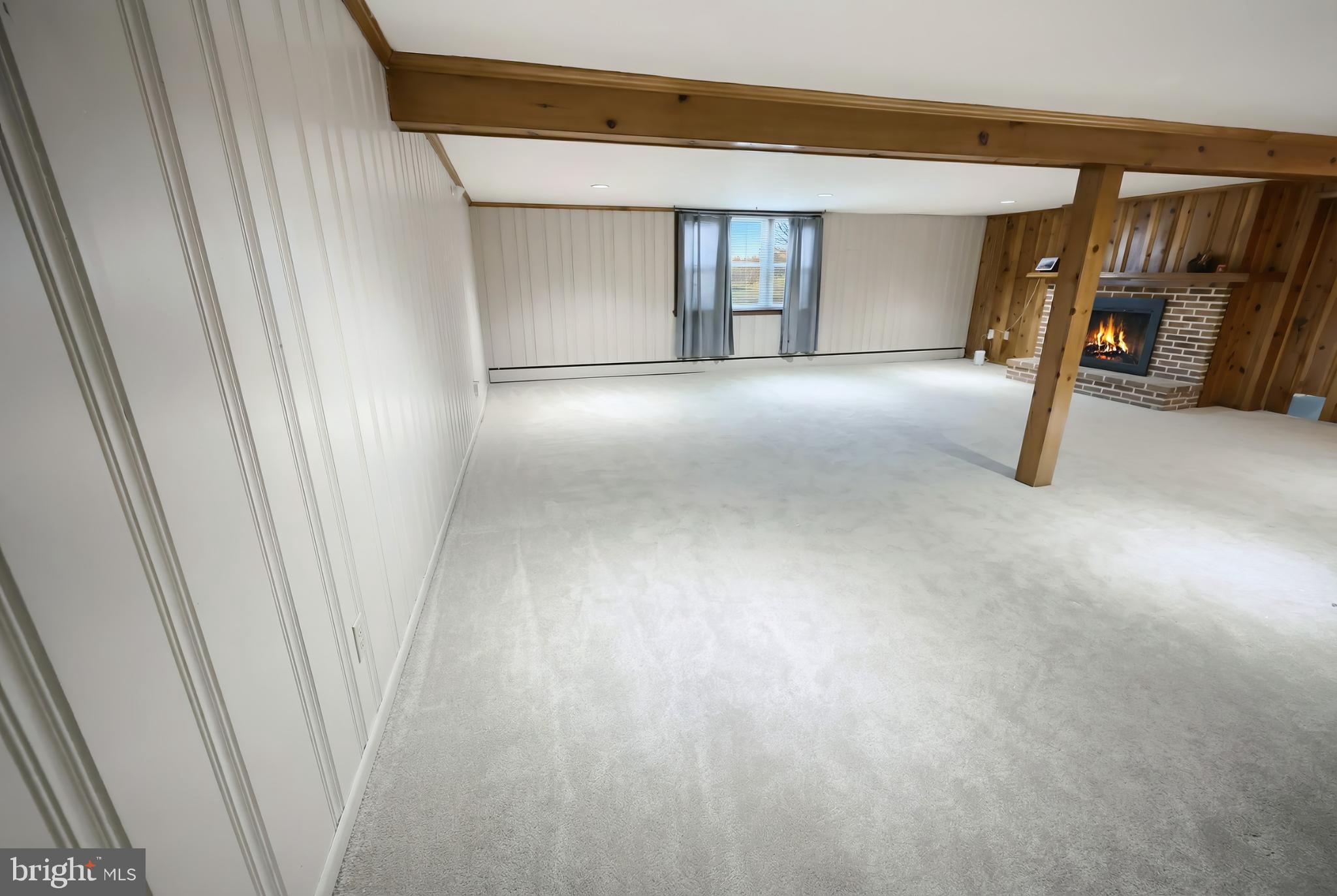 1615 Crestlyn Road York, PA 17403 - Photo 40 of 46 Spacious, inviting room with cozy fireplace.