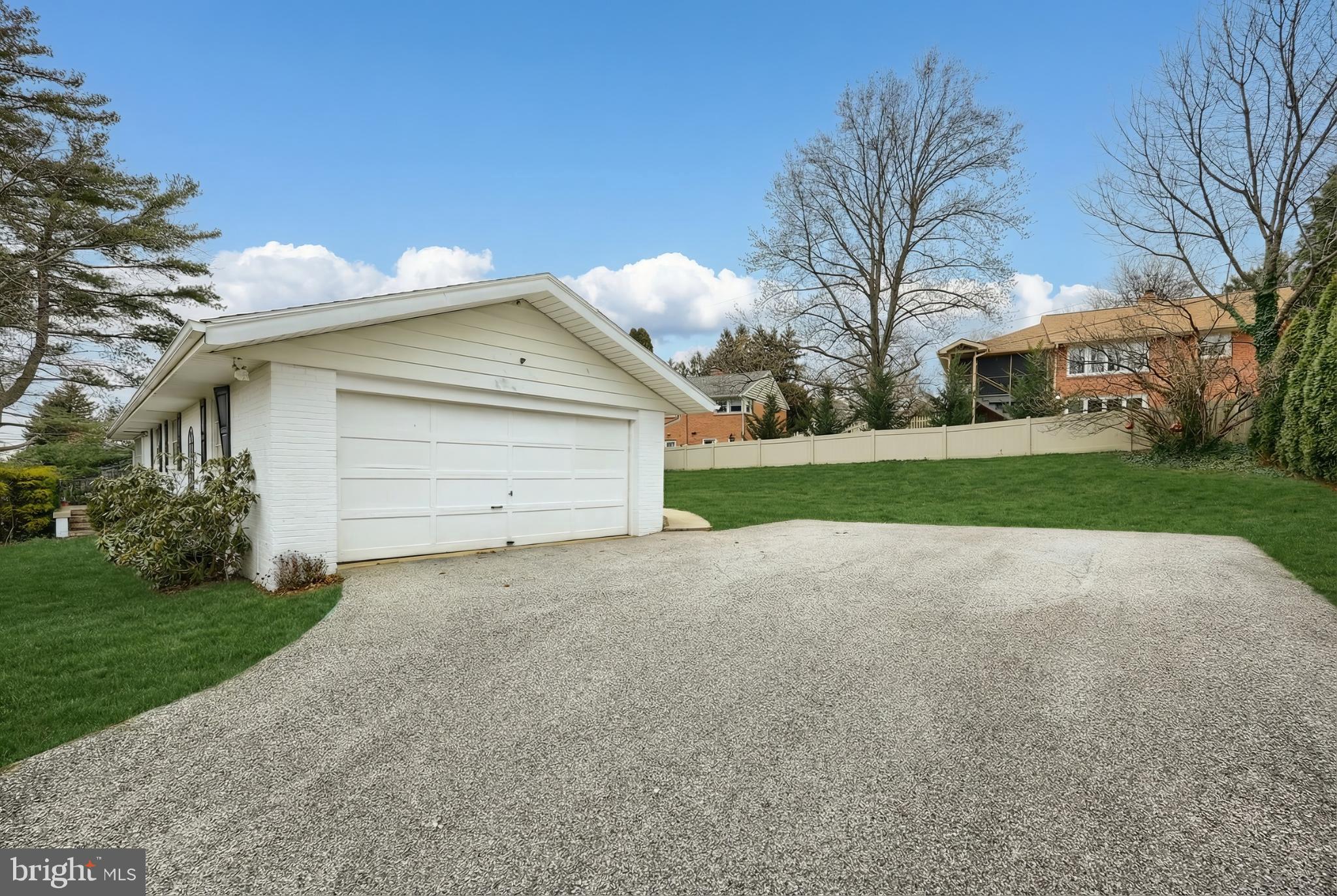 1615 Crestlyn Road York, PA 17403 - Photo 9 of 46 Charming home with spacious driveway and greenery.
